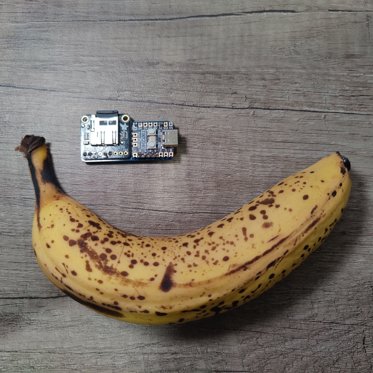 Assembled TinyCPM - Tin2040 and Micro SD card Reader, banana for scale